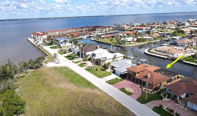 bird's eye view with a water view