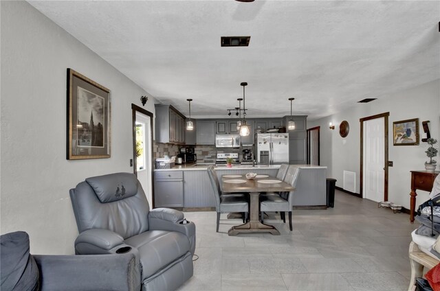 tiled living room with sink