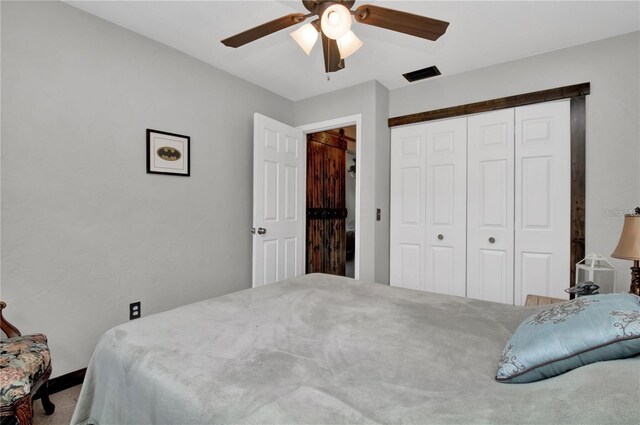 bedroom featuring a closet and ceiling fan