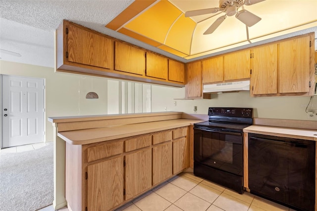 kitchen with a textured ceiling, light tile patterned floors, black appliances, kitchen peninsula, and ceiling fan