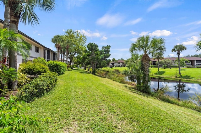 view of yard with a water view