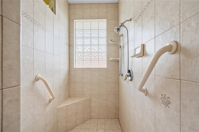 bathroom featuring a tile shower