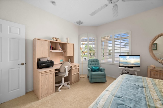 carpeted bedroom featuring ceiling fan