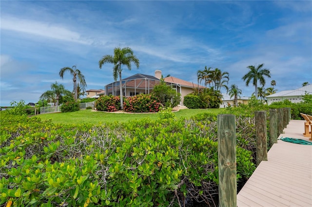 view of yard with a lanai