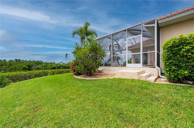 view of yard featuring a lanai