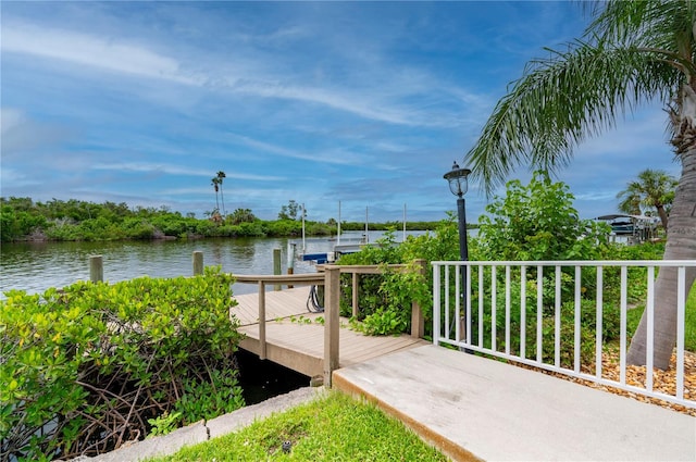 view of patio with a water view