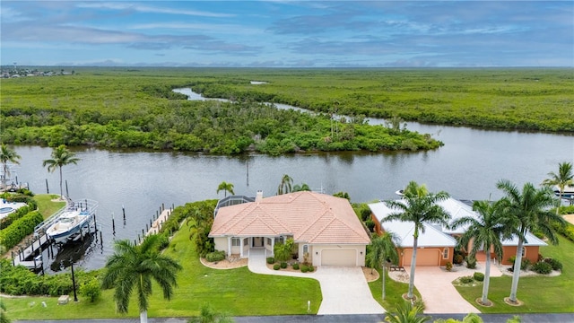 aerial view featuring a rural view and a water view