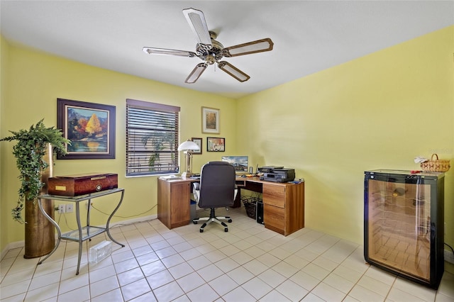 office with light tile patterned flooring and a ceiling fan