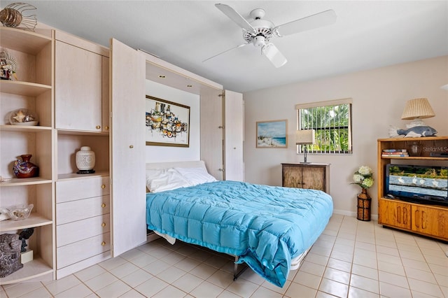 bedroom with light tile patterned floors and ceiling fan