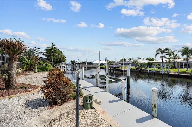 view of dock with a water view and boat lift