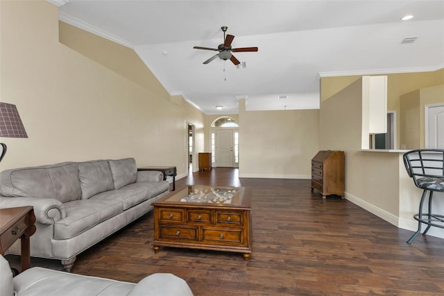 living room with ceiling fan, ornamental molding, dark hardwood / wood-style floors, and vaulted ceiling