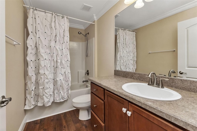 full bathroom with toilet, crown molding, vanity, shower / bath combo with shower curtain, and hardwood / wood-style flooring