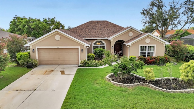 ranch-style house featuring a garage and a front lawn