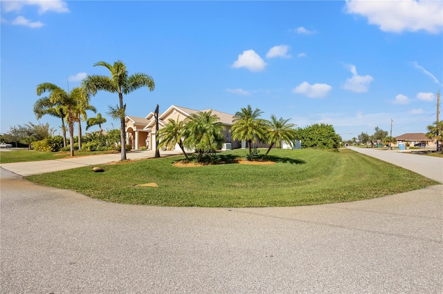 exterior space featuring a front lawn