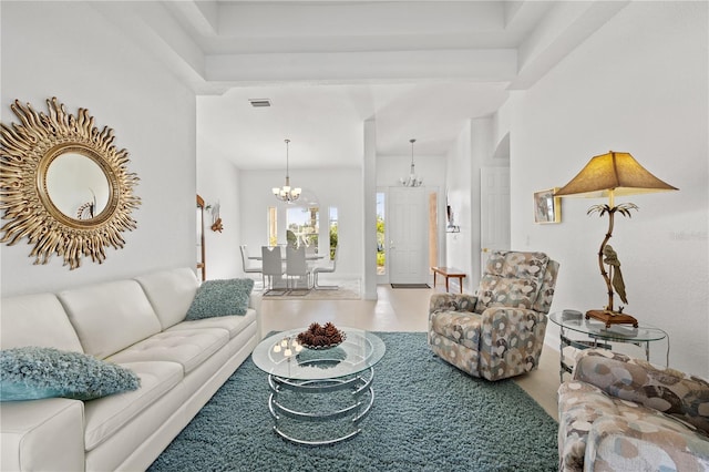 living room with a chandelier