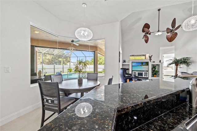 dining room featuring ceiling fan