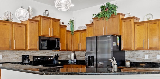 kitchen featuring black appliances, tasteful backsplash, a chandelier, pendant lighting, and kitchen peninsula