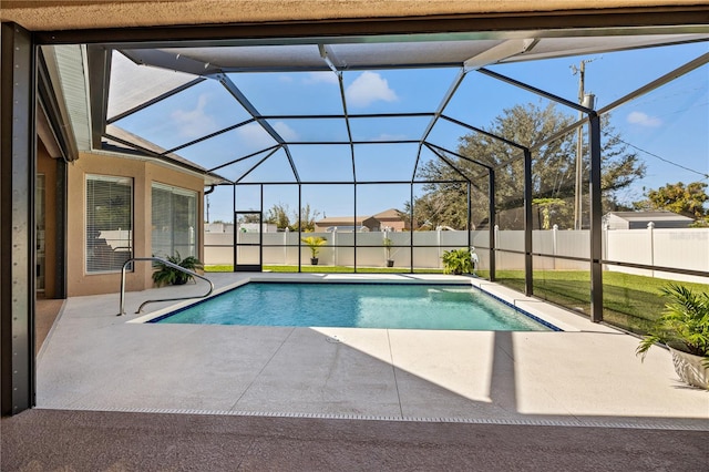 view of pool featuring a patio area and a lanai