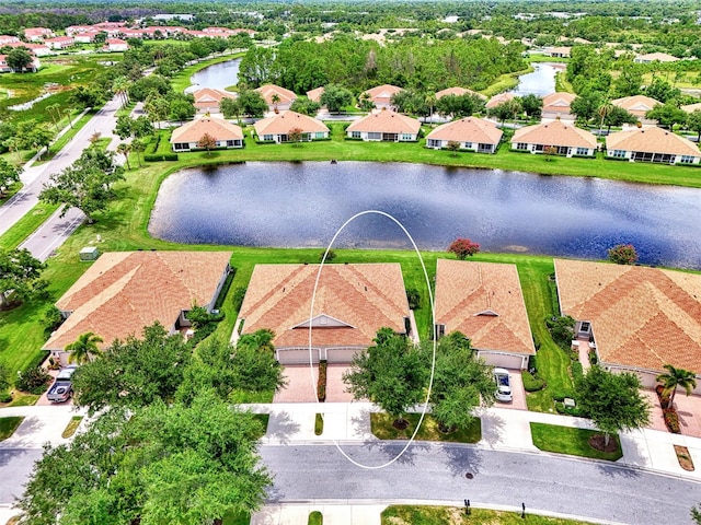 drone / aerial view with a water view