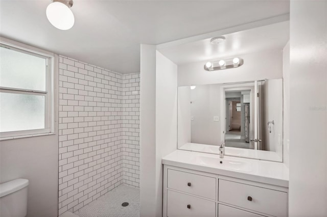 1642 Banyan Dr, Venice, FL 34293 - bathroom featuring toilet, a shower stall, and vanity