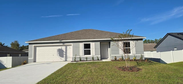 single story home featuring fence, a front lawn, concrete driveway, and a garage