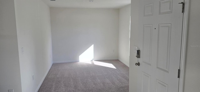 empty room featuring carpet