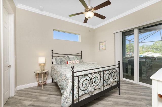 bedroom featuring access to exterior, ornamental molding, hardwood / wood-style floors, and ceiling fan