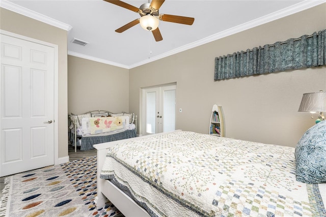 bedroom featuring crown molding and ceiling fan