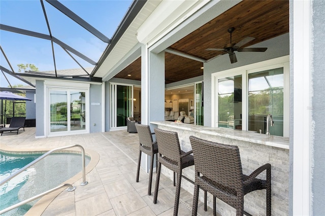 sunroom with wooden ceiling