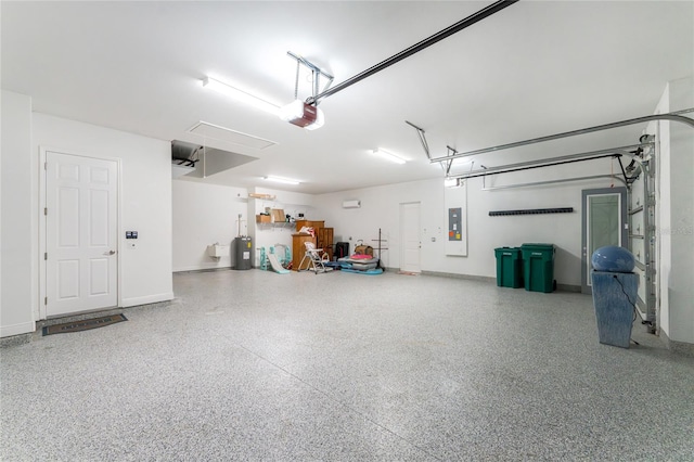 garage with a garage door opener, electric panel, and water heater