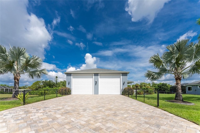 garage with a yard