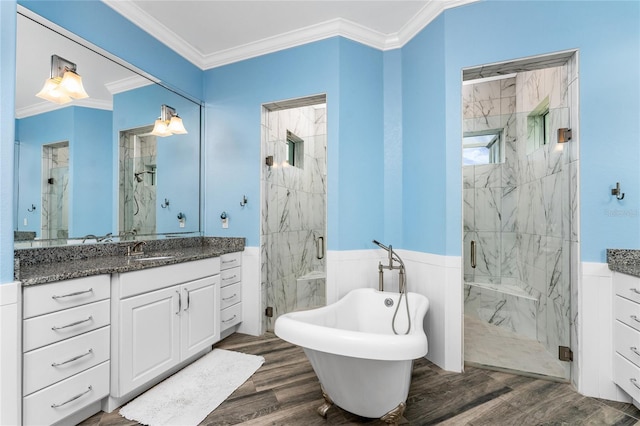 bathroom featuring hardwood / wood-style floors, ornamental molding, and plus walk in shower