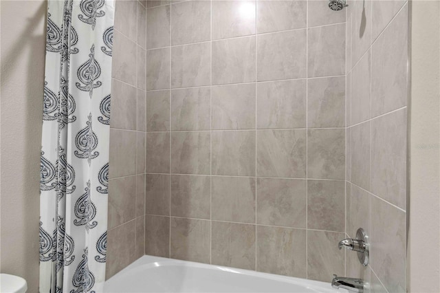 full bathroom with shower / bathtub combination with curtain