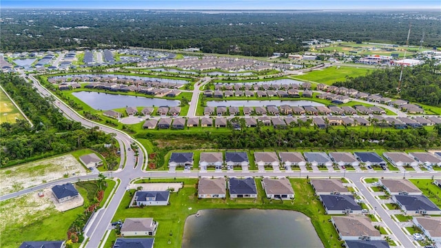 aerial view with a water view and a residential view