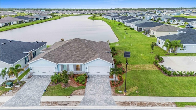 aerial view with a water view and a residential view