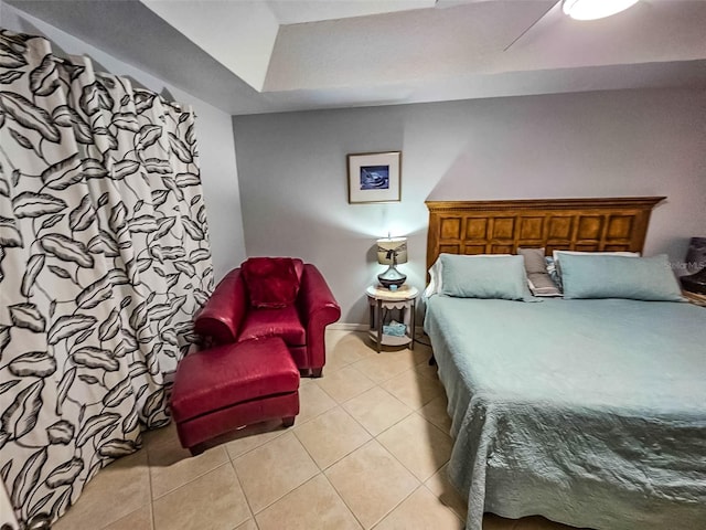 bedroom with light tile patterned flooring and ceiling fan