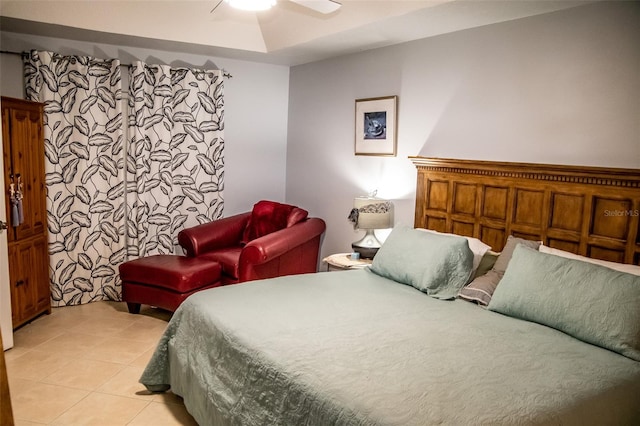 tiled bedroom with ceiling fan