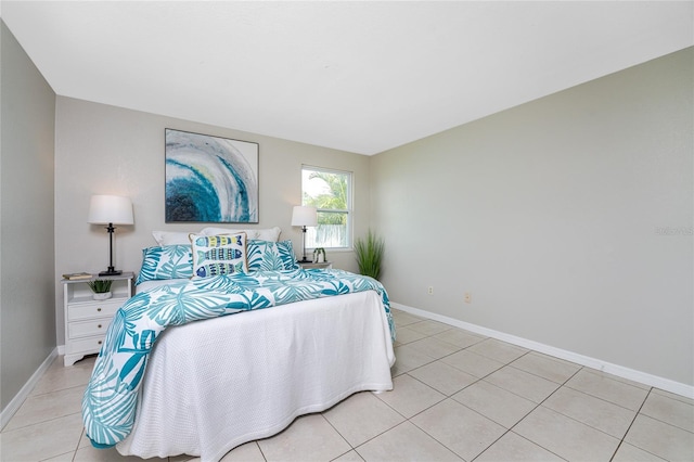 bedroom featuring light tile patterned floors