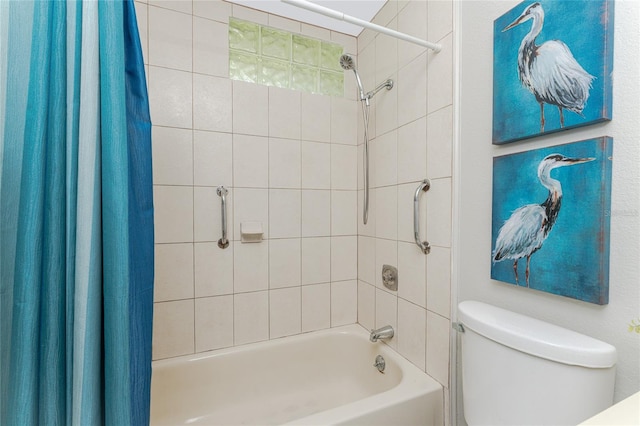 bathroom featuring toilet and shower / bath combo with shower curtain