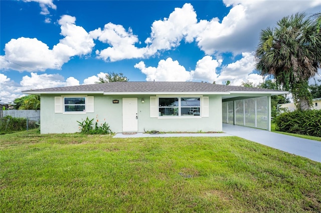 ranch-style home featuring a front lawn