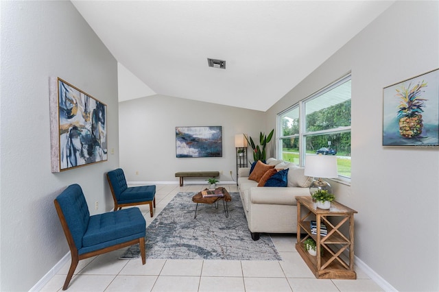 tiled living room featuring lofted ceiling