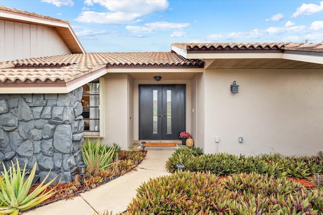 entrance to property featuring french doors