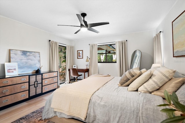 bedroom featuring ceiling fan and light hardwood / wood-style floors