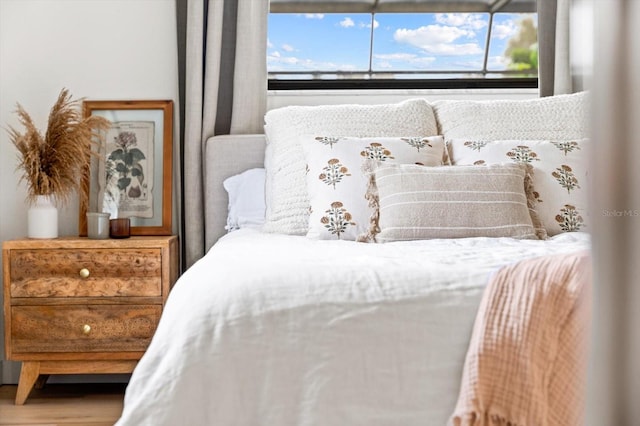 bedroom with multiple windows