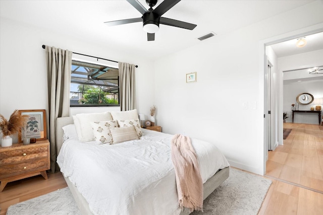 bedroom featuring ceiling fan and light wood-type flooring