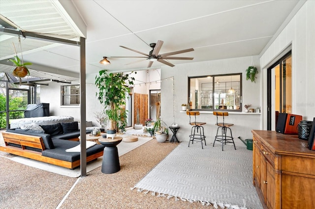 living room featuring ceiling fan