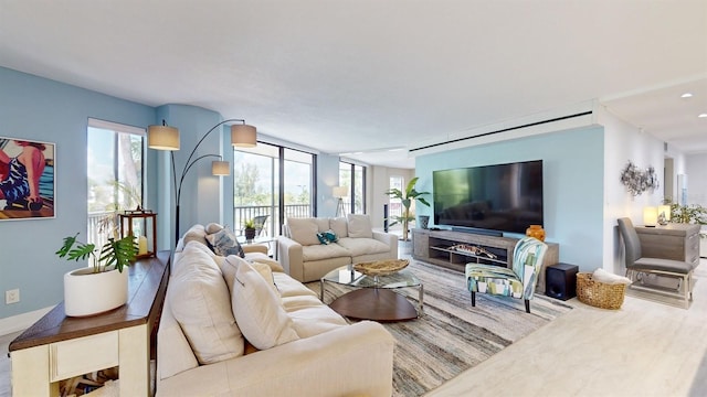 living room featuring a wealth of natural light