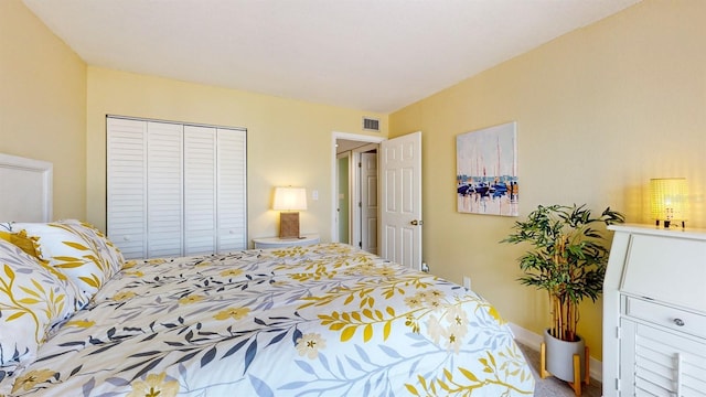 bedroom featuring a closet and carpet flooring