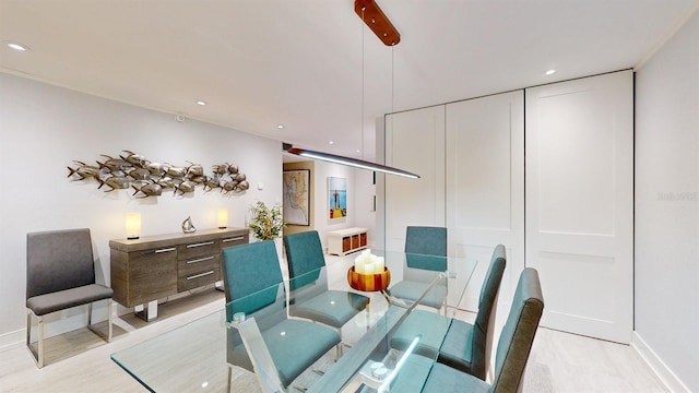 dining room with recessed lighting