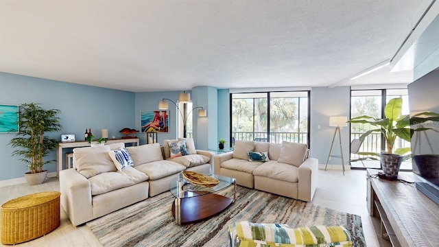 living room featuring a textured ceiling